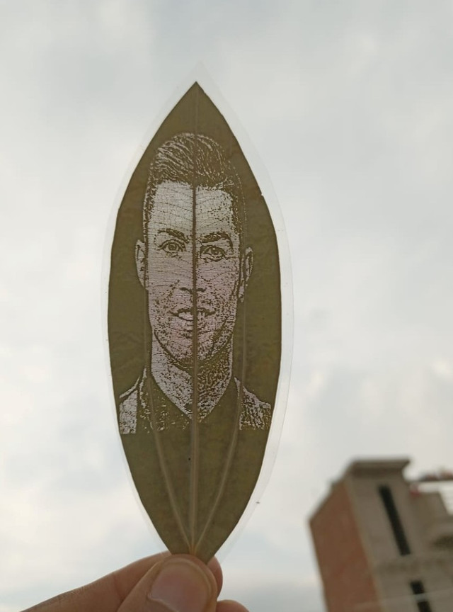 Custom Engraved Leaf Art â€“ Football Icon Portrait on Natural Lea